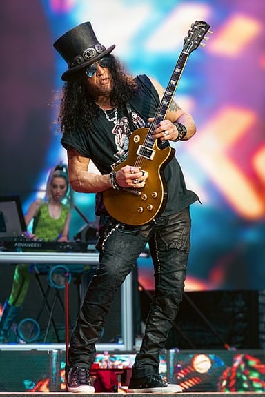 In which year did Slash return to Guns N' Roses?