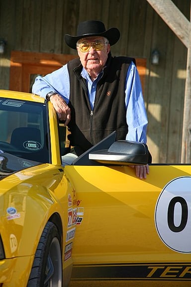 Who is known for his involvement with the AC Cobra and Mustang?