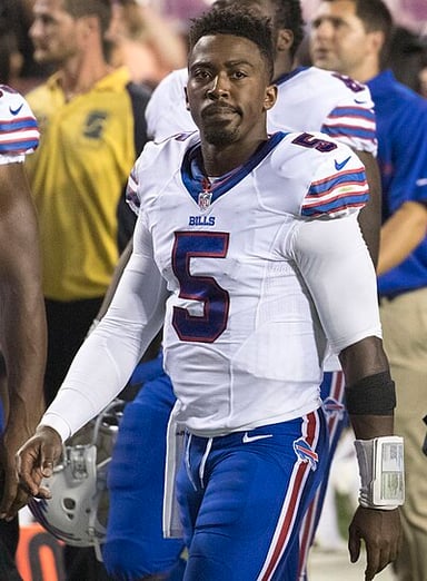 Who did Tyrod Taylor throw his first professional TD pass to?
