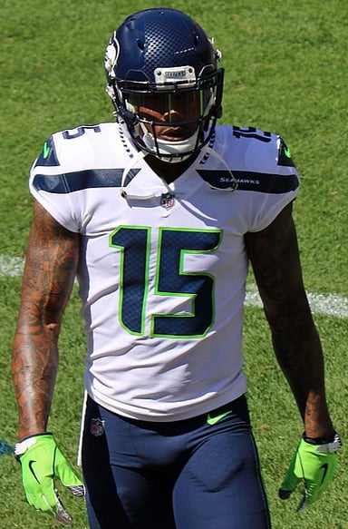 Which college did Brandon Marshall represent in football?