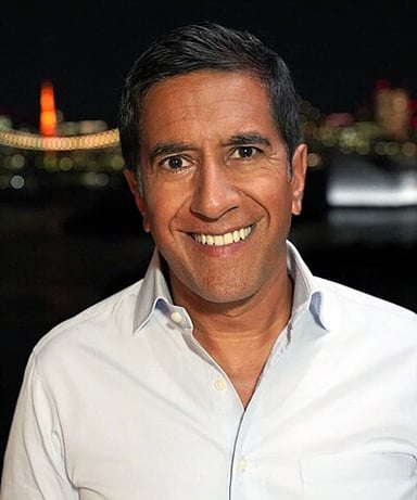 Which academy is Sanjay Gupta a member of?