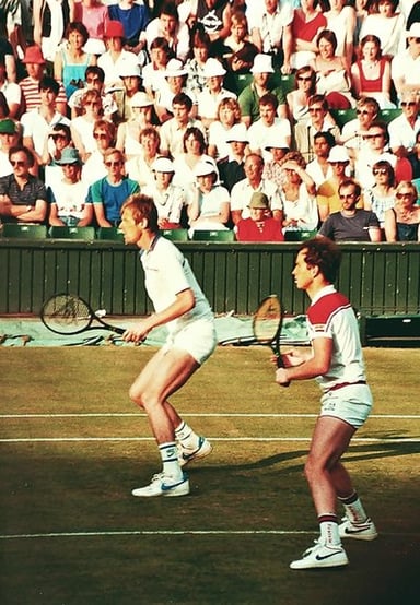 How many singles titles did John McEnroe win on the ATP Tour?