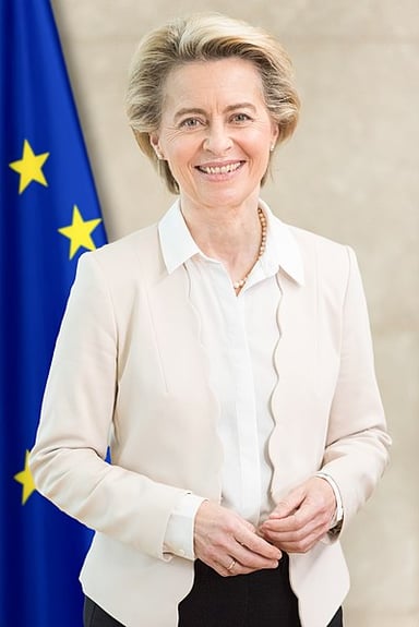 What position did Ursula von der Leyen hold in the German federal government before becoming the President of the European Commission?
