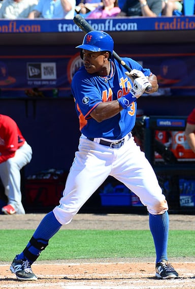 Off the field, Granderson is known for his commitment to what?
