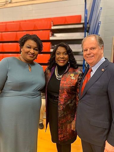 Abrams has been credited with boosting voter turnout in Georgia for which political party's benefit?