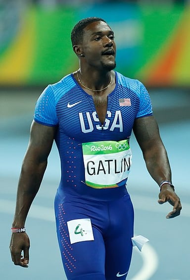 During which championship did Gatlin become the most decorated 100m sprinter in history?