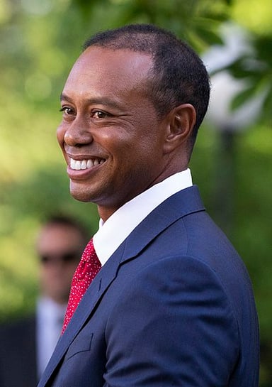 What is Tiger Woods's religion or worldview?