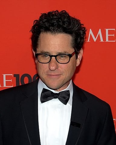 For which TV series did J.J. Abrams win an Emmy for Outstanding Directing?