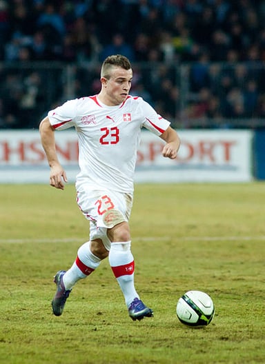 Which American city is home to Shaqiri's current club, Chicago Fire?