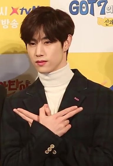 Which label is Mark Tuan associated with?