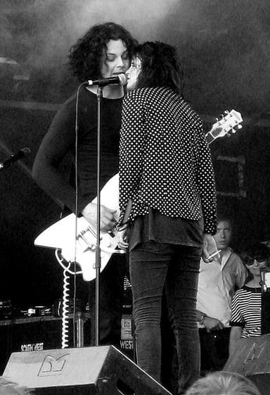 What instrument did Jack White play in his early underground bands?