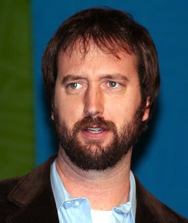 In which film does Tom Green play a pet snake feeder?