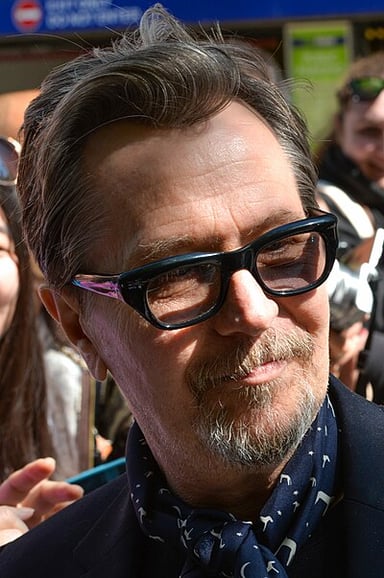 Which music video did Gary Oldman appear in alongside David Bowie?