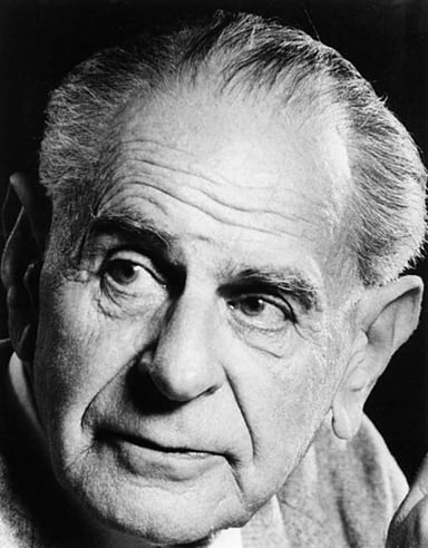 What did Karl Popper believe made a flourishing open society possible?