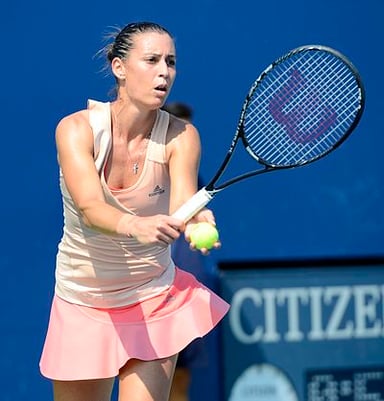Which doubles tournament did Flavia Pennetta finish as runner-up in 2014?