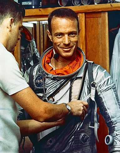 In what year was Scott Carpenter selected as one of the Mercury Seven astronauts?