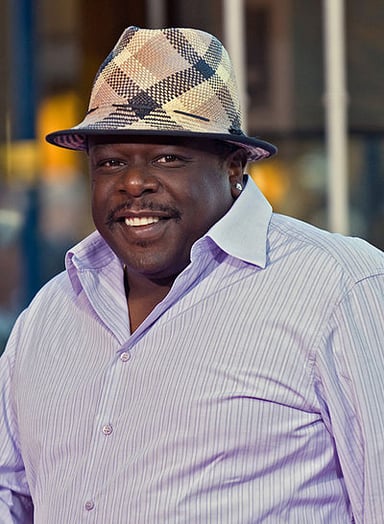 What was Cedric the Entertainer's profession in "Barbershop"?