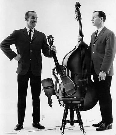 Did the Smothers Brothers start their career in folk music?