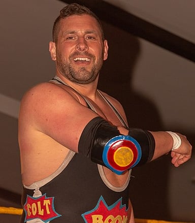 When was Colt Cabana released from his WWE contract?