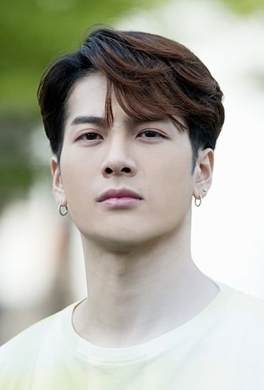 What genre is Jackson Wang's group, Panthepack, known for?