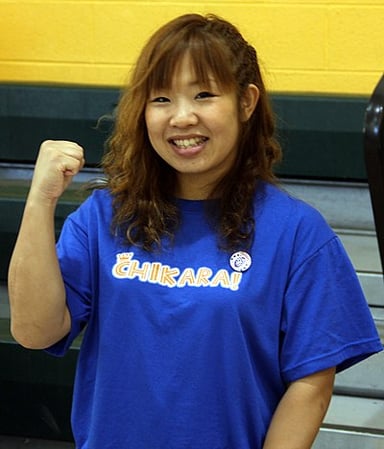 Which title did Yoneyama win in All Japan Women's Pro-Wrestling?