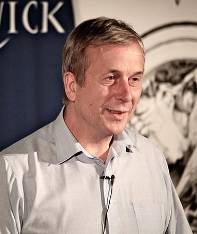 Kevin Warwick has a strong interest in what futuristic concept?