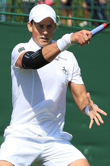 Who was Vasek Pospisil's partner when he won the 2014 Wimbledon Championships?