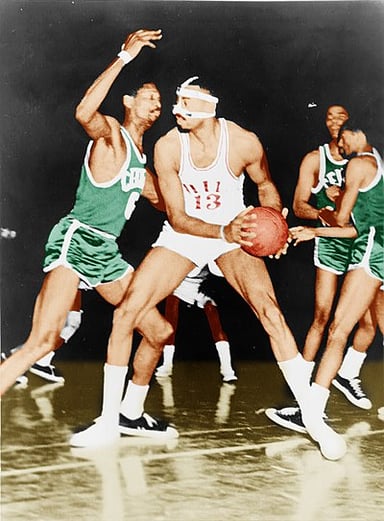 Bill Russell plays sports for which country?