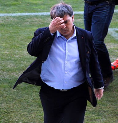 Which club did Martino coach directly after leaving Barcelona?