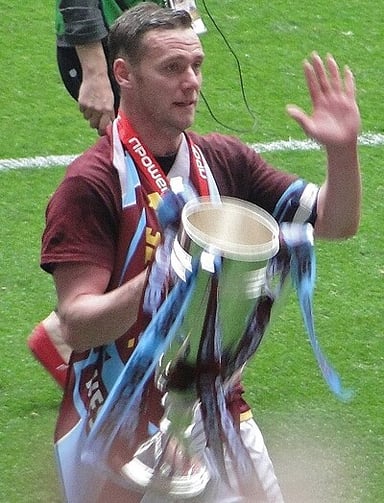 Which club did Kevin Nolan lead to an instant return to the Premier League?