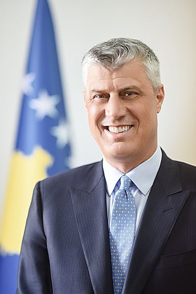 Which cabinet did Thaçi join as Foreign Minister and Deputy Prime Minister?