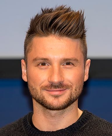 Is Sergey Lazarev also a television host besides being a singer, dancer, and actor?