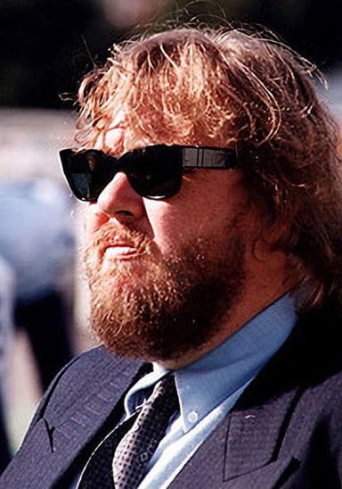 In which film did John Candy appear as a bumbling security guard?