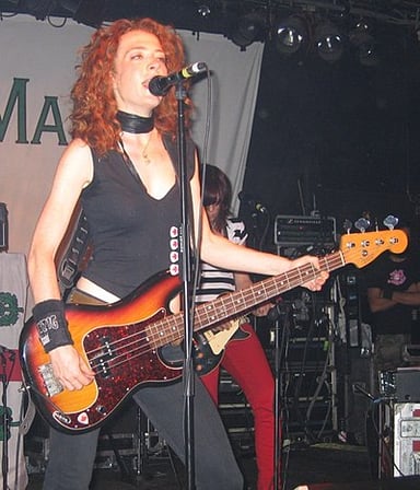 Melissa was recruited to Hole after being spotted playing with which band?