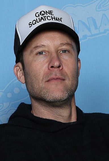 Name one of the podcasts Michael Rosenbaum hosts.