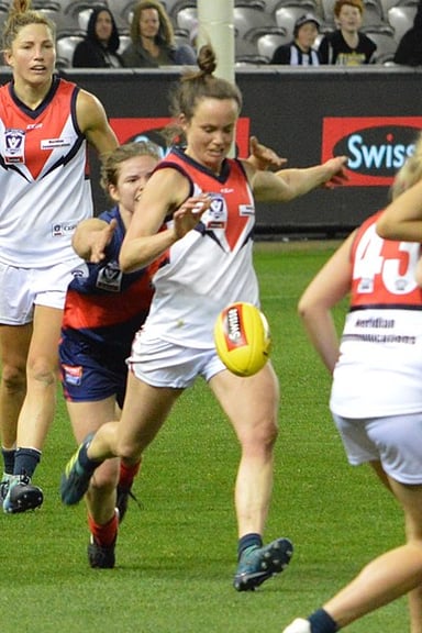 In which season did Melbourne win its first AFL Women's premiership under Daisy Pearce's leadership?