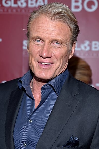 In which film did Dolph Lundgren first appear alongside Sylvester Stallone?
