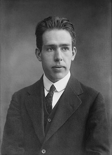 What was Niels Bohr's major contribution to atomic structure?