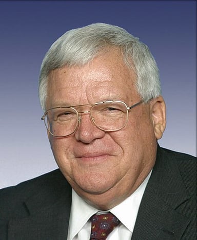 What was the name of the lobbying firm Hastert joined after resigning from the House?