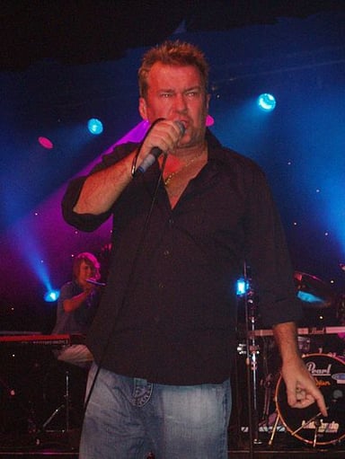 What genre of music is Jimmy Barnes primarily known for?