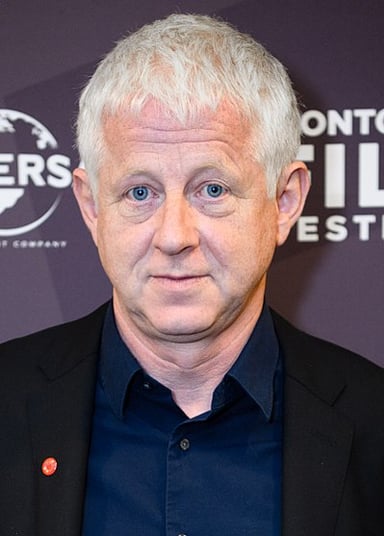 In what year did Richard Curtis receive the BAFTA Fellowship for lifetime achievement?