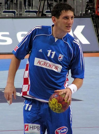 For which team did Mirza Džomba play before retiring in 2011?
