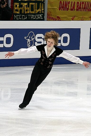 At which occasion did he perform three quads in the free skate?