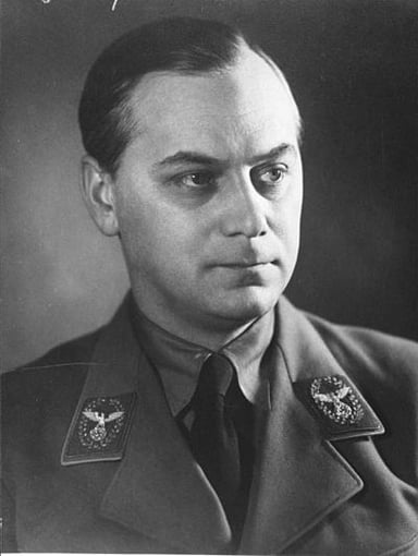 When was Rosenberg first introduced to Hitler?