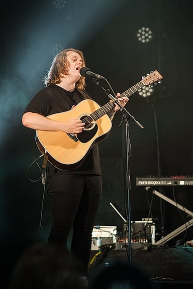 Which instrument did Lewis Capaldi learn to play at the age of 9?
