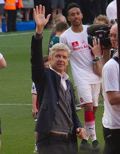 Which French cup competition did Wenger win with AS Monaco?