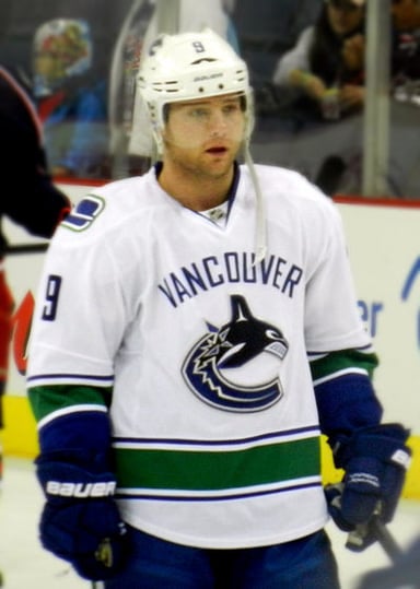 In 2011, which final did Hodgson participate in with the Canucks?