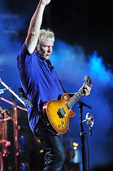 What is Alex Lifeson's real name?