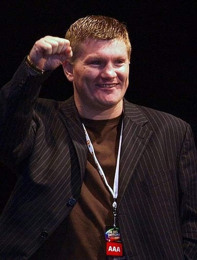 Who was Ricky Hatton's trainer for the majority of his career?