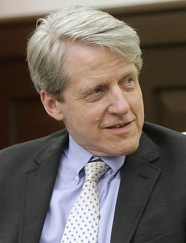 What was Robert J. Shiller's prediction for the stock and housing markets in 2005?